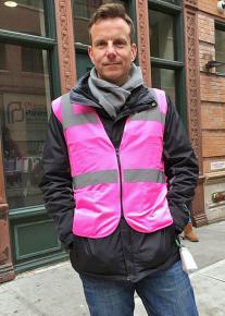 An anti-choice protester poses as a clinic escort outside Planned Parenthood in Manhattan